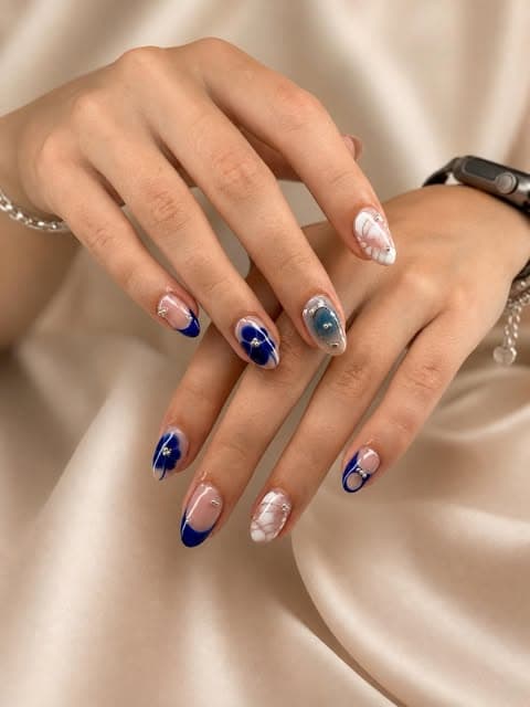 Deep blue French with pearl accents